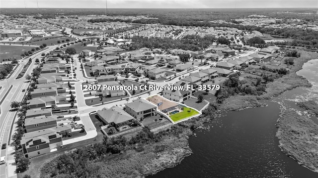 12607 Pensacola Ct, Riverview, FL 33579 - aerial view of residential area with a large body of water and property boundaries highlighted