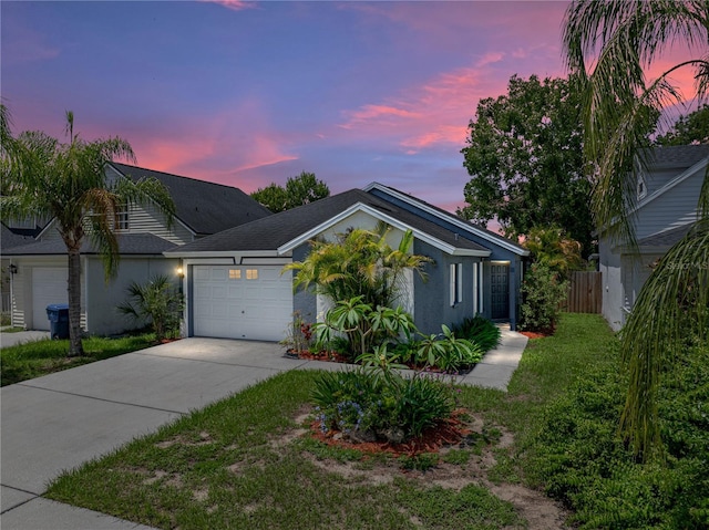 22829 Saint Thomas Cir, Lutz, FL 33549 - single story home featuring concrete driveway, an attached garage, and stucco siding