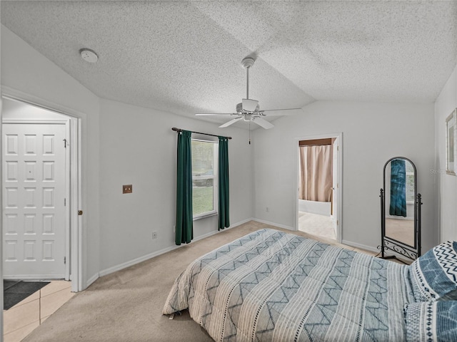 22829 Saint Thomas Cir, Lutz, FL 33549 - bedroom featuring lofted ceiling, a textured ceiling, a ceiling fan, and connected bathroom