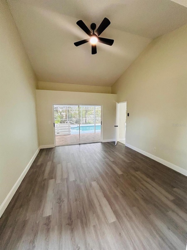 10444 Fordham St, Spring Hill, FL 34608 - spare room with ceiling fan, dark wood finished floors, and high vaulted ceiling