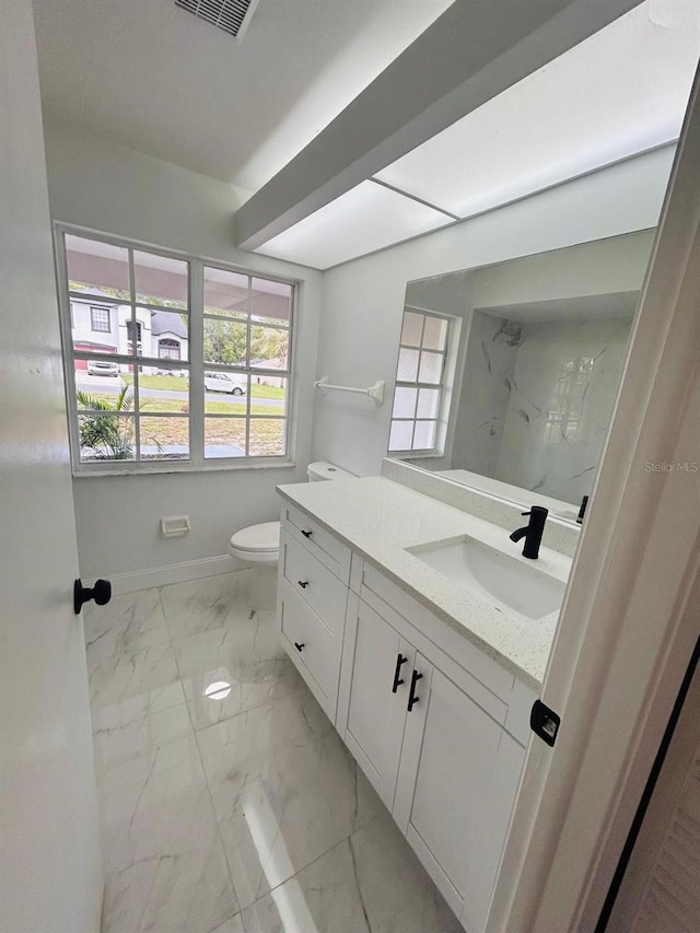 10444 Fordham St, Spring Hill, FL 34608 - full bath featuring marble finish floors, vanity, and a marble finish shower