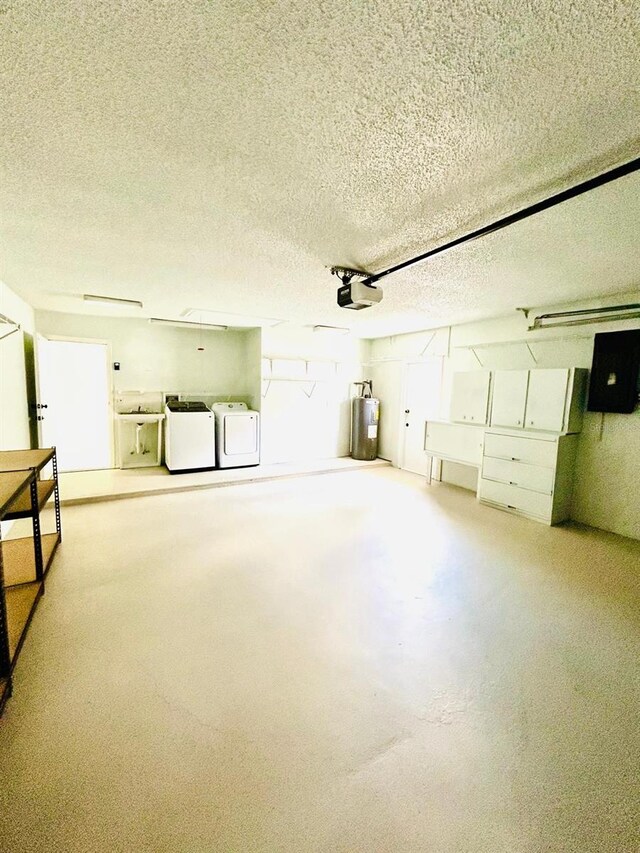 10444 Fordham St, Spring Hill, FL 34608 - garage with independent washer and dryer, electric water heater, and a garage door opener