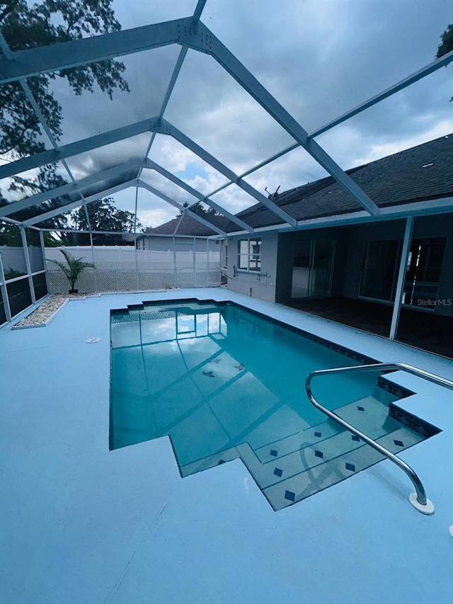 10444 Fordham St, Spring Hill, FL 34608 - view of pool with a patio, a fenced backyard, and glass enclosure