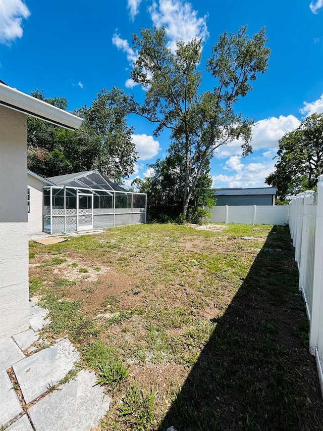 10444 Fordham St, Spring Hill, FL 34608 - fenced backyard featuring a lanai