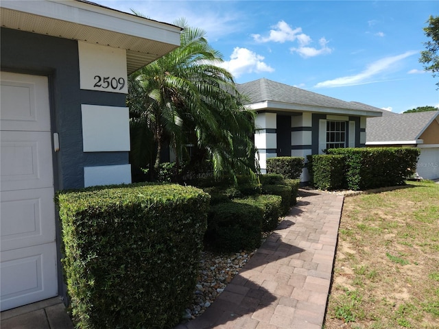 2509 Montecito Ave, Eustis, FL 32726 - entrance to property featuring stucco siding