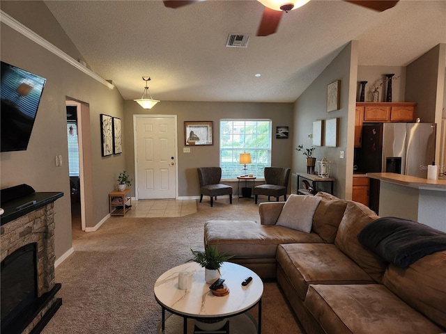2509 Montecito Ave, Eustis, FL 32726 - carpeted living room with ceiling fan, vaulted ceiling, a fireplace, and a textured ceiling