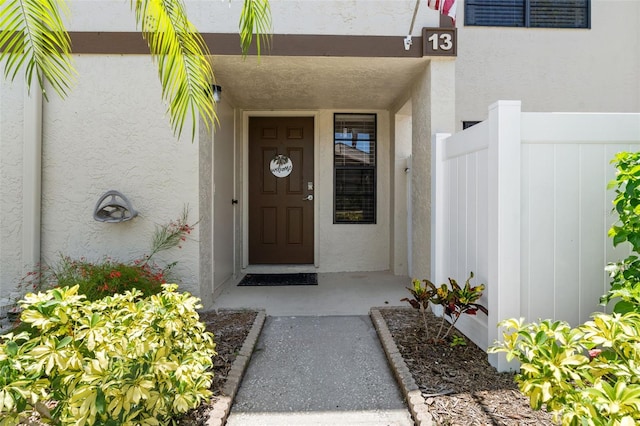 9209 Seminole Blvd Unit 13, Seminole, FL 33772 - view of exterior entry featuring stucco siding