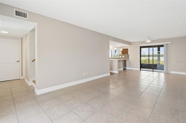 9209 Seminole Blvd Unit 13, Seminole, FL 33772 - spare room featuring light tile patterned flooring and baseboards