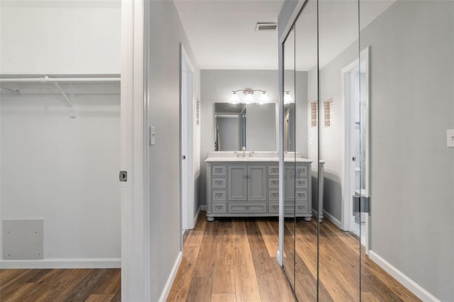 9209 Seminole Blvd Unit 13, Seminole, FL 33772 - bathroom with vanity and wood finished floors