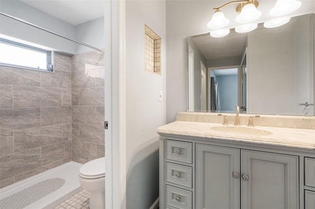 9209 Seminole Blvd Unit 13, Seminole, FL 33772 - bathroom featuring vanity, tiled shower, and tile patterned floors