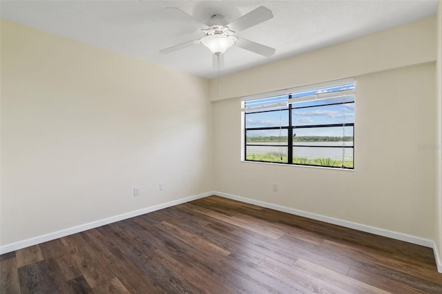 9209 Seminole Blvd Unit 13, Seminole, FL 33772 - empty room featuring dark wood-style flooring and ceiling fan