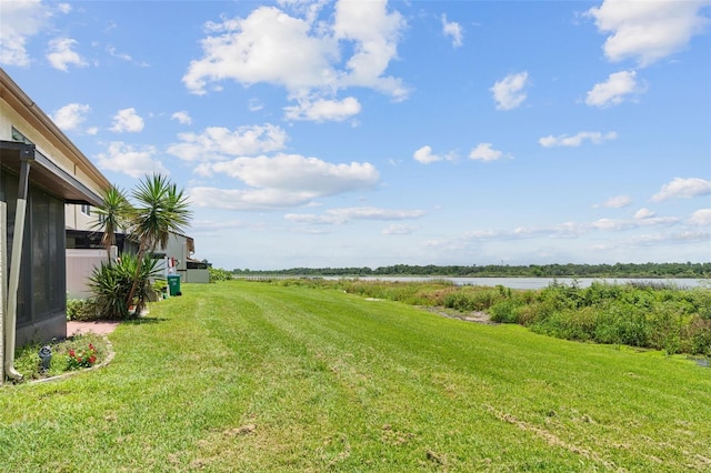 9209 Seminole Blvd Unit 13, Seminole, FL 33772 - view of grassy yard featuring a water view