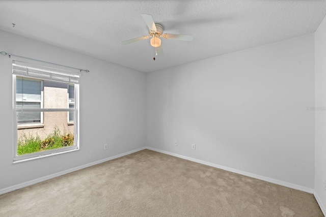 547 Summer Sails Dr, Valrico, FL 33594 - carpeted spare room with baseboards and ceiling fan