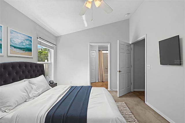 547 Summer Sails Dr, Valrico, FL 33594 - bedroom featuring light colored carpet, vaulted ceiling, and ceiling fan