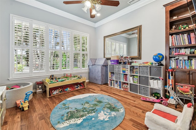 17906 Loretta Ln, Lutz, FL 33548 - rec room featuring ornamental molding, ceiling fan, and wood finished floors