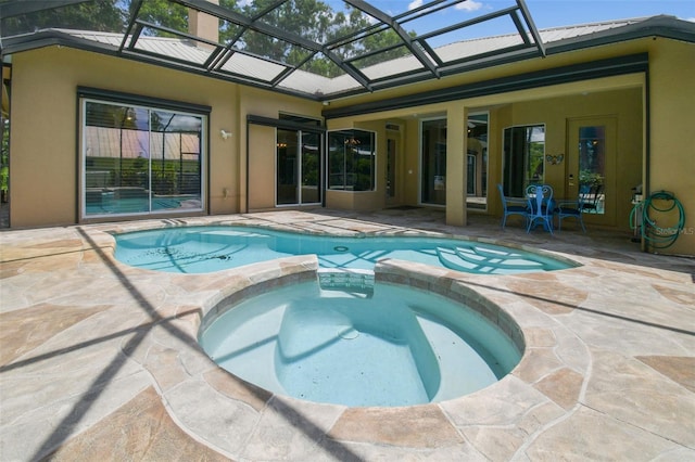 17906 Loretta Ln, Lutz, FL 33548 - view of swimming pool featuring a patio, a pool with connected hot tub, and glass enclosure