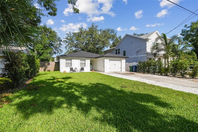 206 N Beverly Ave Unit 1/2, Tampa, FL 33609 - traditional home featuring concrete driveway, a garage, and stucco siding