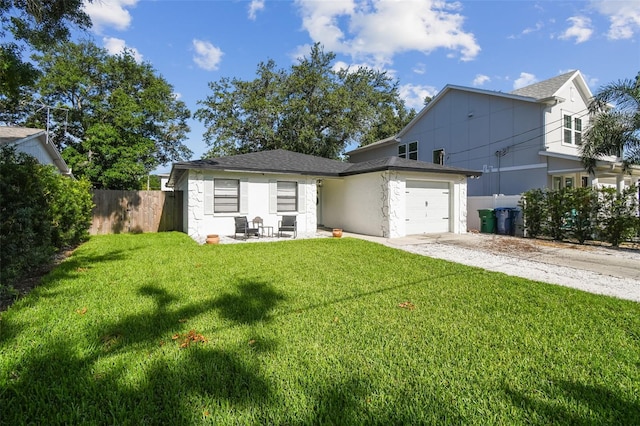 206 N Beverly Ave Unit 1/2, Tampa, FL 33609 - view of front of house with driveway, an attached garage, roof with shingles, and stucco siding