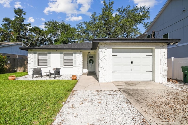 206 N Beverly Ave Unit 1/2, Tampa, FL 33609 - view of front of home featuring a garage, driveway, and stucco siding