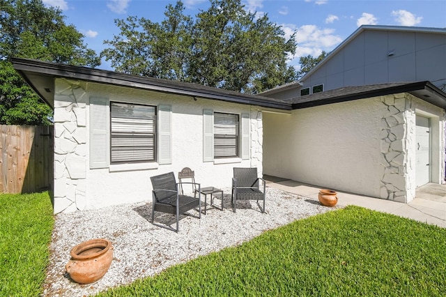 206 N Beverly Ave Unit 1/2, Tampa, FL 33609 - rear view of house featuring a patio area and stucco siding