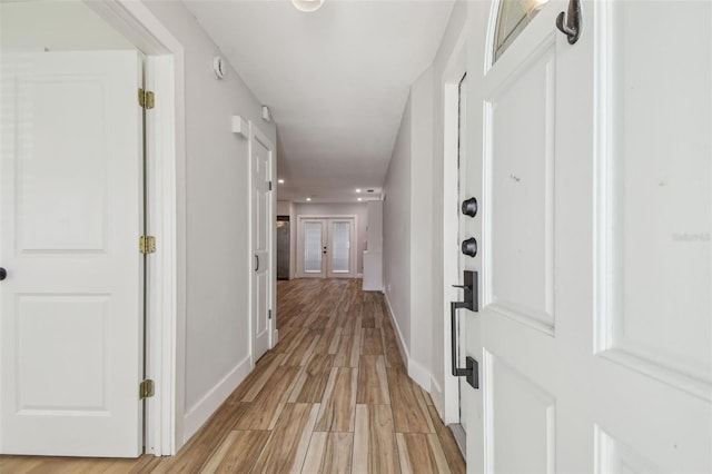 206 N Beverly Ave Unit 1/2, Tampa, FL 33609 - hall with light wood-type flooring and baseboards