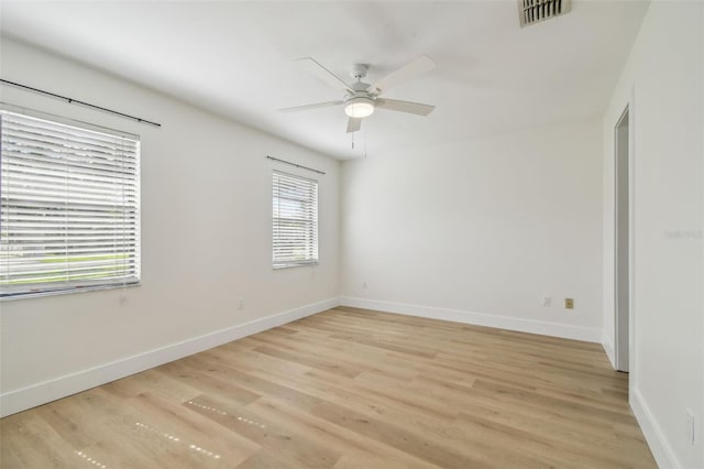 206 N Beverly Ave Unit 1/2, Tampa, FL 33609 - spare room featuring ceiling fan and light wood-style flooring