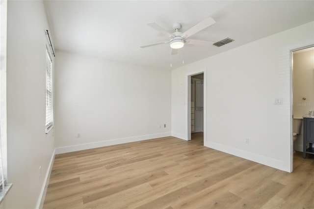206 N Beverly Ave Unit 1/2, Tampa, FL 33609 - unfurnished bedroom featuring light wood-type flooring and a ceiling fan