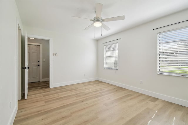 206 N Beverly Ave Unit 1/2, Tampa, FL 33609 - unfurnished room featuring light wood-style flooring and ceiling fan