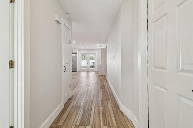 206 N Beverly Ave Unit 1/2, Tampa, FL 33609 - corridor featuring light wood-style flooring, french doors, and recessed lighting