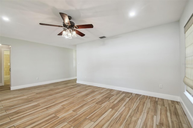 206 N Beverly Ave Unit 1/2, Tampa, FL 33609 - empty room featuring a ceiling fan and light wood-style floors