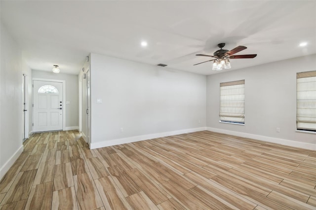 206 N Beverly Ave Unit 1/2, Tampa, FL 33609 - foyer entrance featuring ceiling fan, light wood-style floors, and recessed lighting