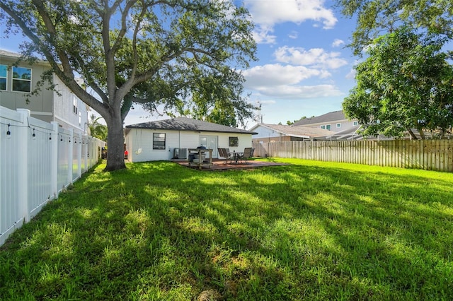 206 N Beverly Ave Unit 1/2, Tampa, FL 33609 - rear view of property featuring a patio and a fenced backyard