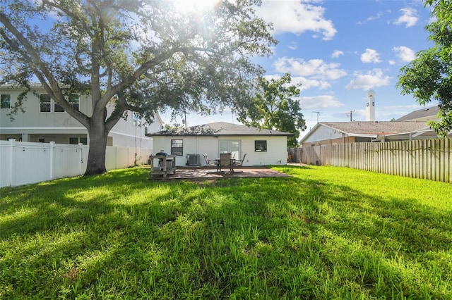 206 N Beverly Ave Unit 1/2, Tampa, FL 33609 - back of house featuring a fenced backyard and a deck