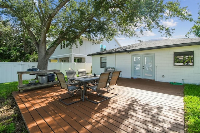 206 N Beverly Ave Unit 1/2, Tampa, FL 33609 - wooden terrace featuring french doors and outdoor dining area