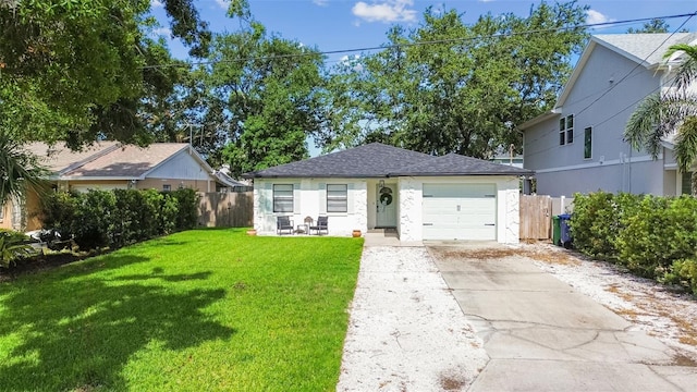 206 N Beverly Ave Unit 1/2, Tampa, FL 33609 - view of front of home with an attached garage, driveway, and roof with shingles