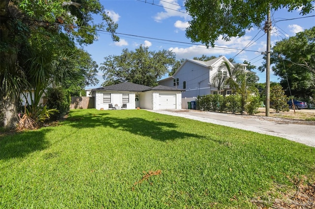 206 N Beverly Ave Unit 1/2, Tampa, FL 33609 - view of front of property featuring concrete driveway and a garage