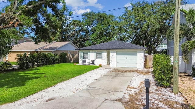 206 N Beverly Ave Unit 1/2, Tampa, FL 33609 - view of front of house with concrete driveway, an attached garage, a shingled roof, and stucco siding