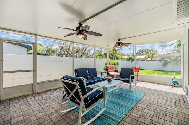 2025 Jefferson Ave, Dunedin, FL 34698 - sunroom / solarium featuring an outdoor hangout area and ceiling fan