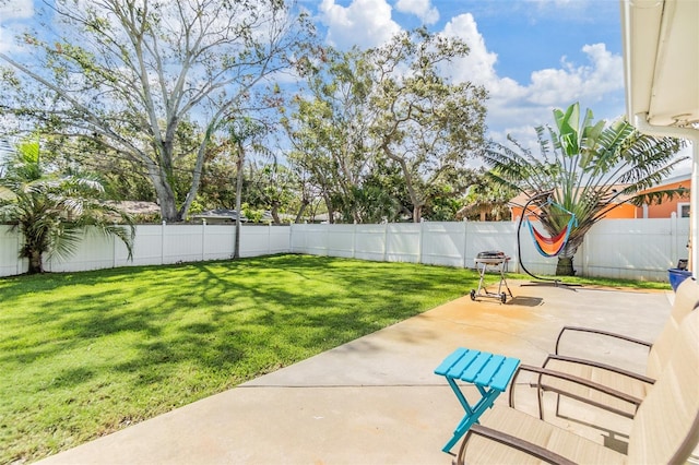 2025 Jefferson Ave, Dunedin, FL 34698 - fenced backyard featuring a patio area
