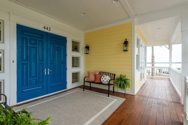 442 Midway Is, Clearwater Beach, FL 33767 - property entrance featuring covered porch