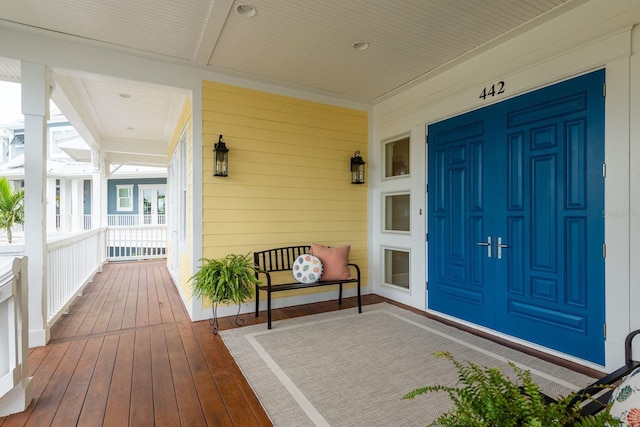 442 Midway Is, Clearwater Beach, FL 33767 - entrance to property featuring covered porch