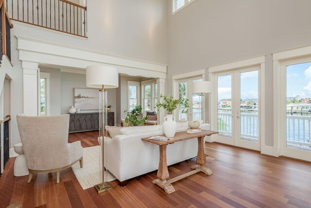 442 Midway Is, Clearwater Beach, FL 33767 - living area featuring a high ceiling and wood finished floors