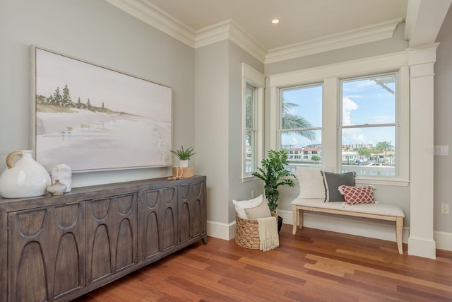 442 Midway Is, Clearwater Beach, FL 33767 - sitting room featuring light wood-style flooring, plenty of natural light, ornamental molding, and recessed lighting