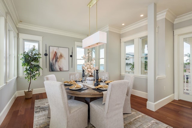 442 Midway Is, Clearwater Beach, FL 33767 - dining room with plenty of natural light, wood finished floors, ornamental molding, and recessed lighting