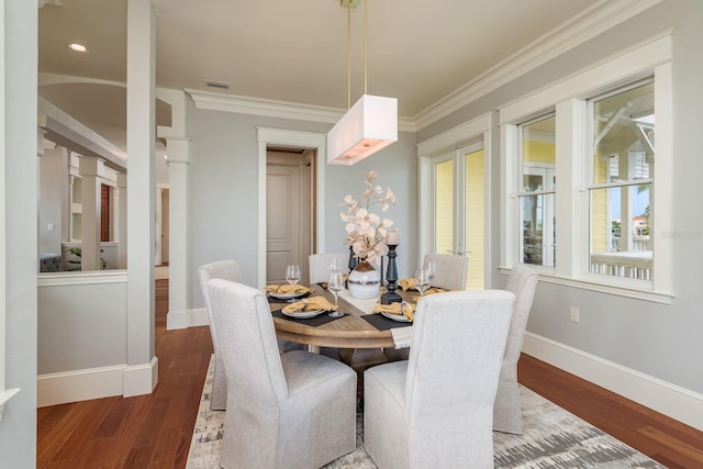 442 Midway Is, Clearwater Beach, FL 33767 - dining area featuring crown molding, wood finished floors, and recessed lighting