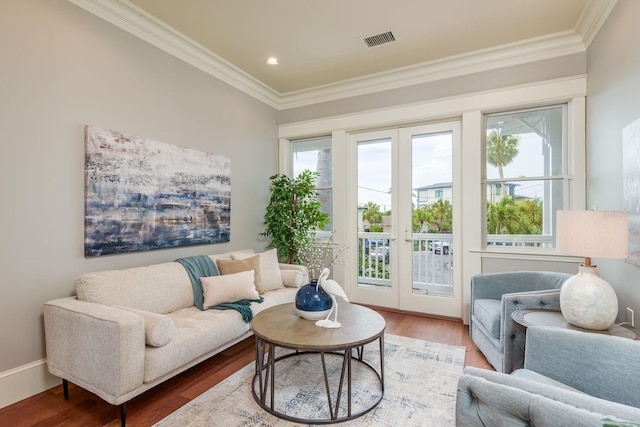 442 Midway Is, Clearwater Beach, FL 33767 - living area featuring ornamental molding, wood finished floors, healthy amount of natural light, and recessed lighting