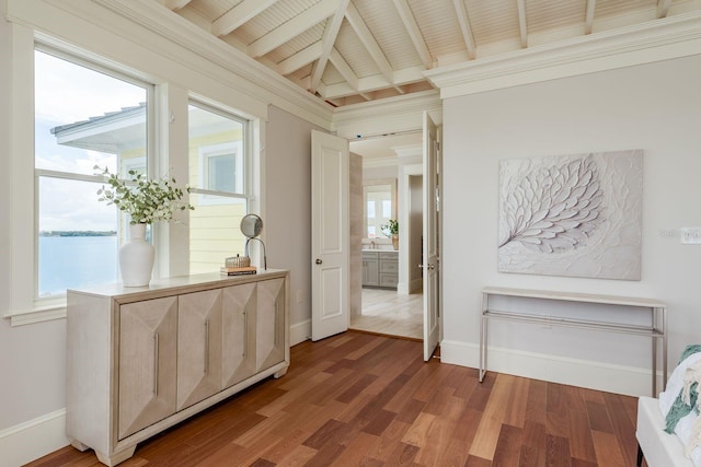 442 Midway Is, Clearwater Beach, FL 33767 - corridor featuring wood finished floors, healthy amount of natural light, and beamed ceiling