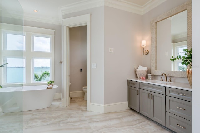 442 Midway Is, Clearwater Beach, FL 33767 - full bathroom featuring vanity, a freestanding bath, and crown molding