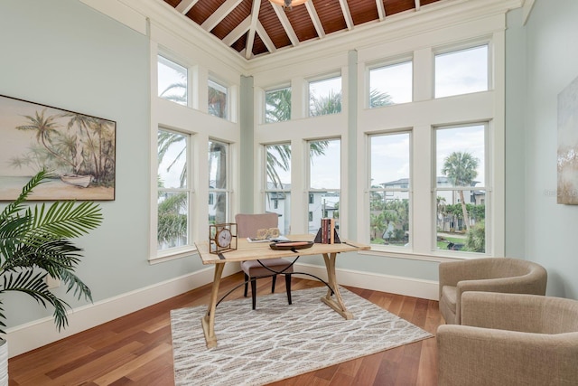 442 Midway Is, Clearwater Beach, FL 33767 - office space featuring a high ceiling, wood finished floors, and a wooden ceiling with exposed beams