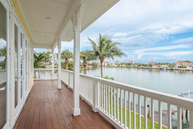 442 Midway Is, Clearwater Beach, FL 33767 - wooden terrace featuring a water view